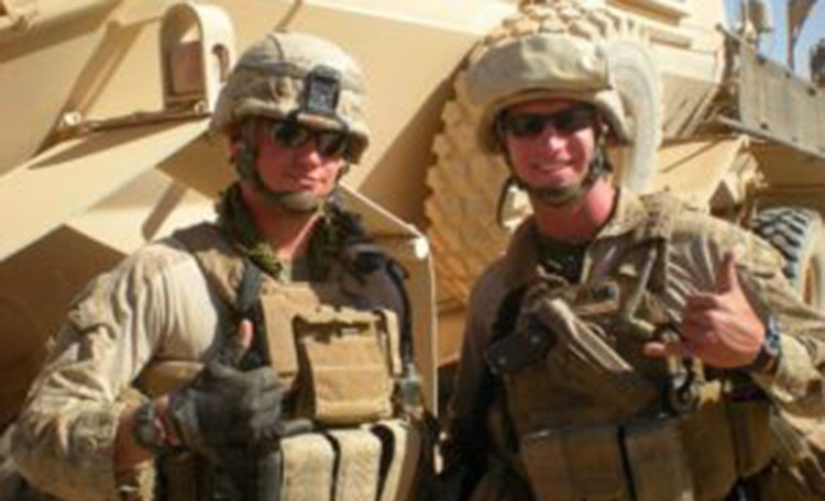 Chris Walsh and Military Partner with Tank