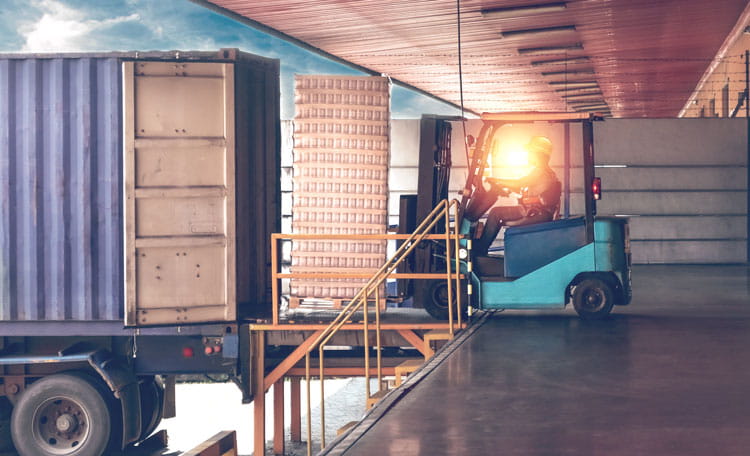 Lorry unloading at warehouse