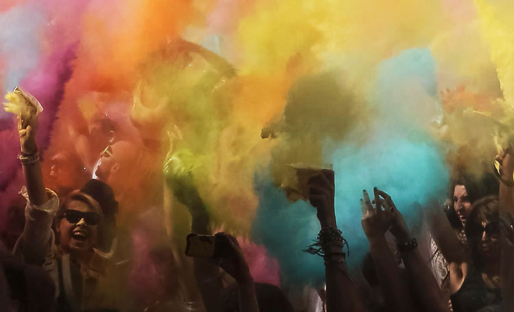 People enjoying a colour powder party